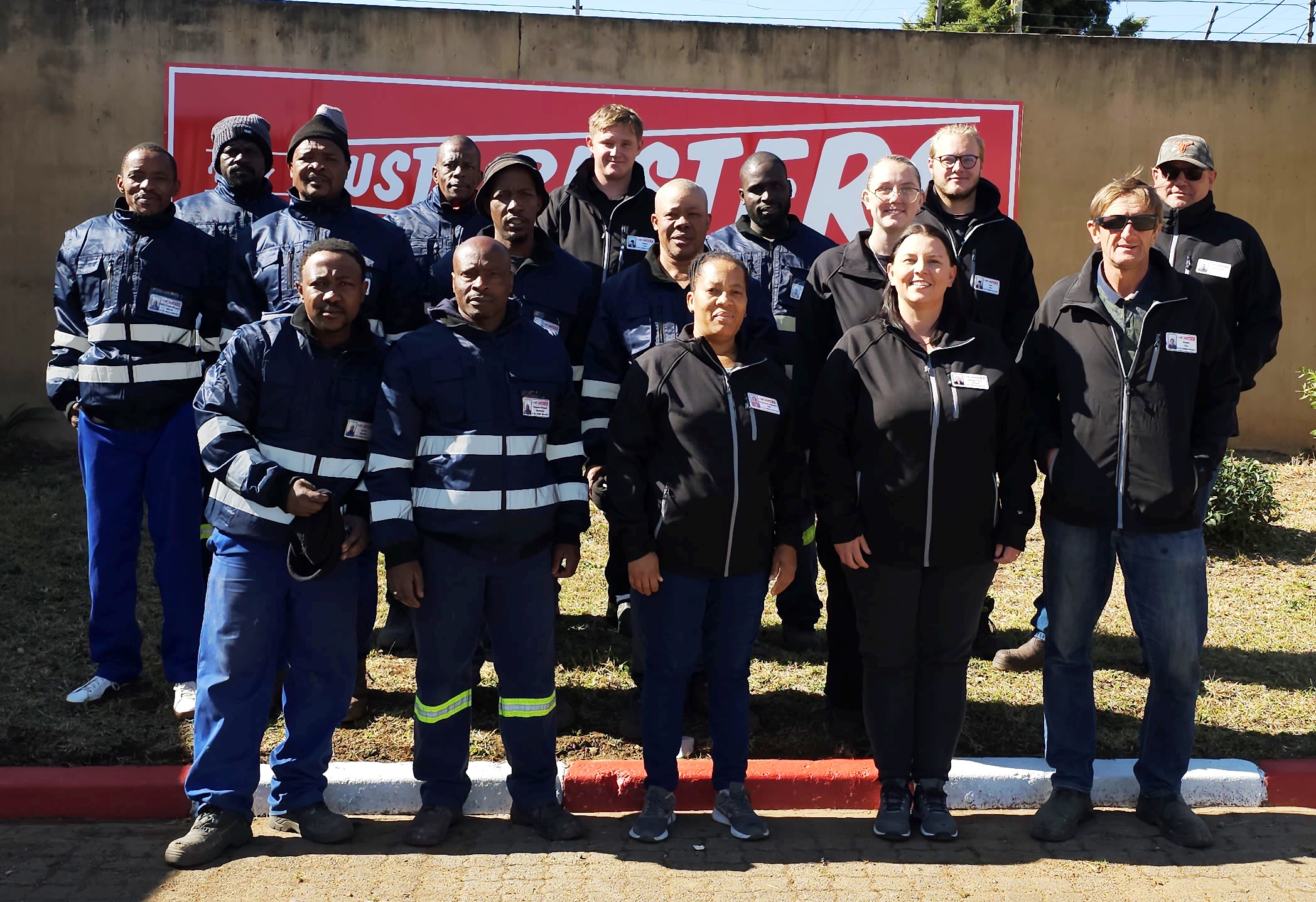 The Rust Busters team outside the Roodekop facility